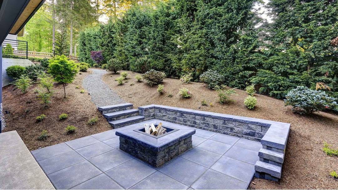 Stamped concrete patio with outdoor furniture