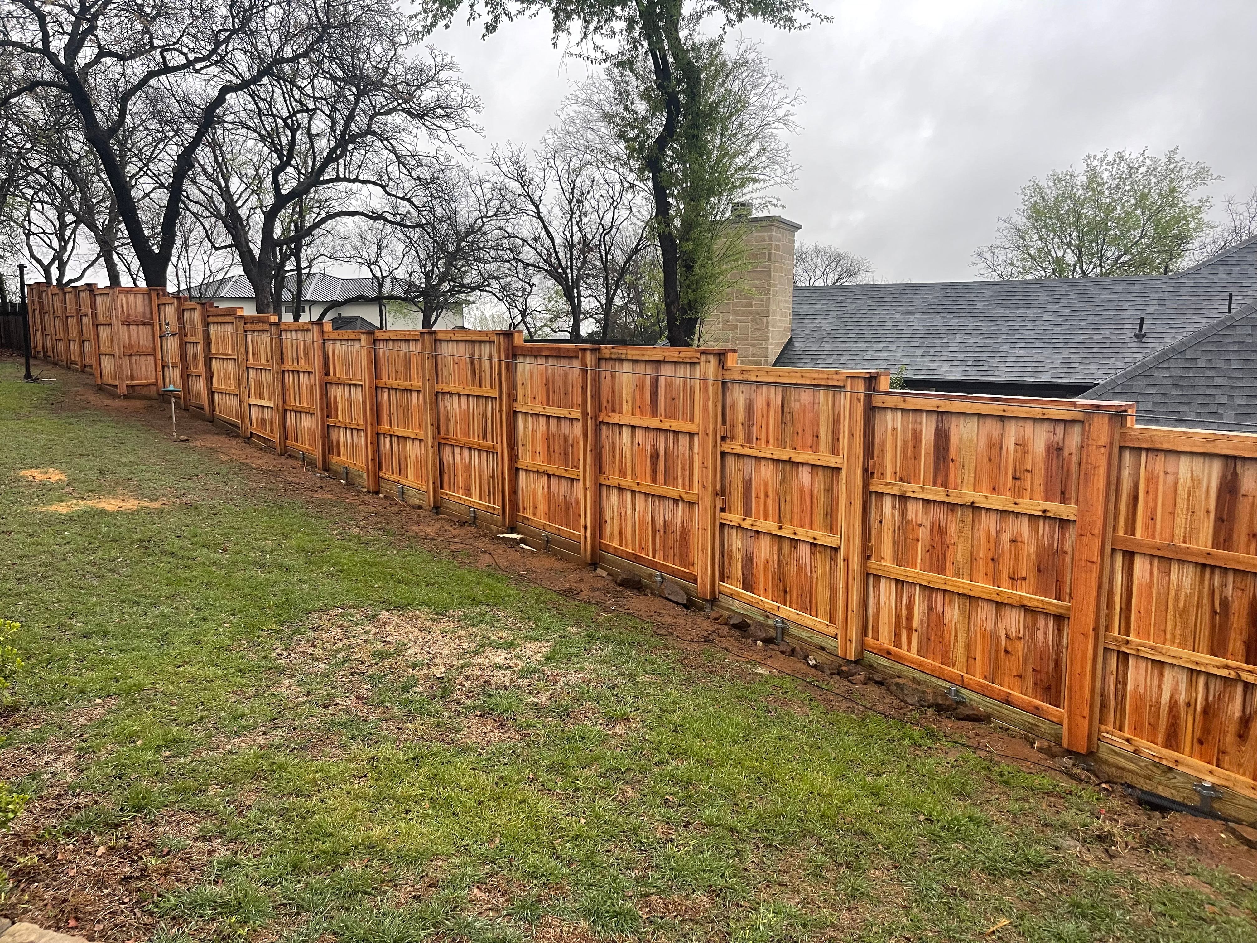 Cedar fence with metal posts