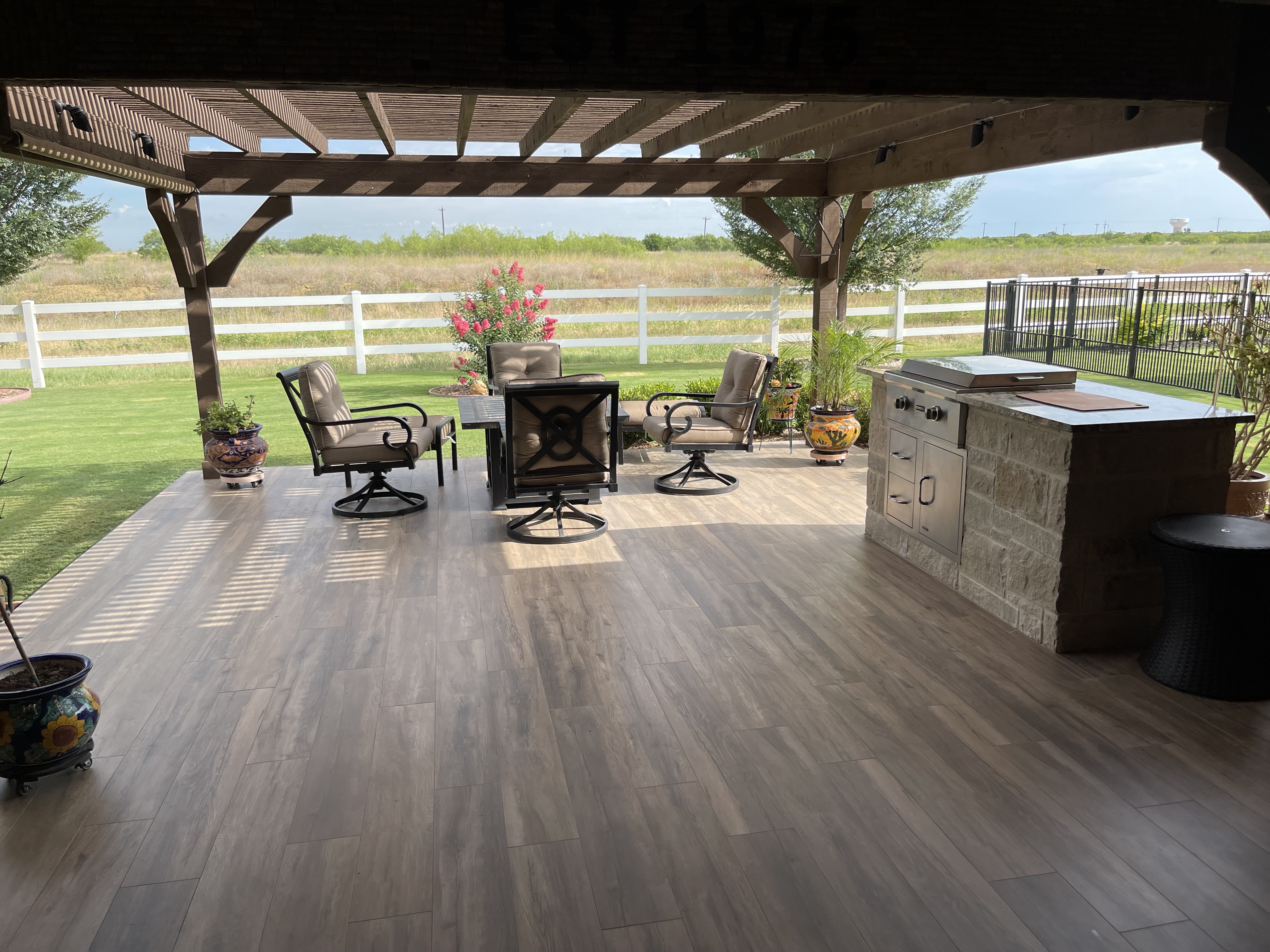 Custom cedar pergola with outdoor seating area